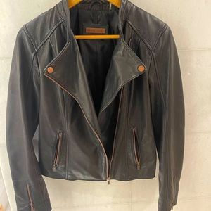 Black rivet, Authentic leather beautiful jacket. In perfect condition. Size S
